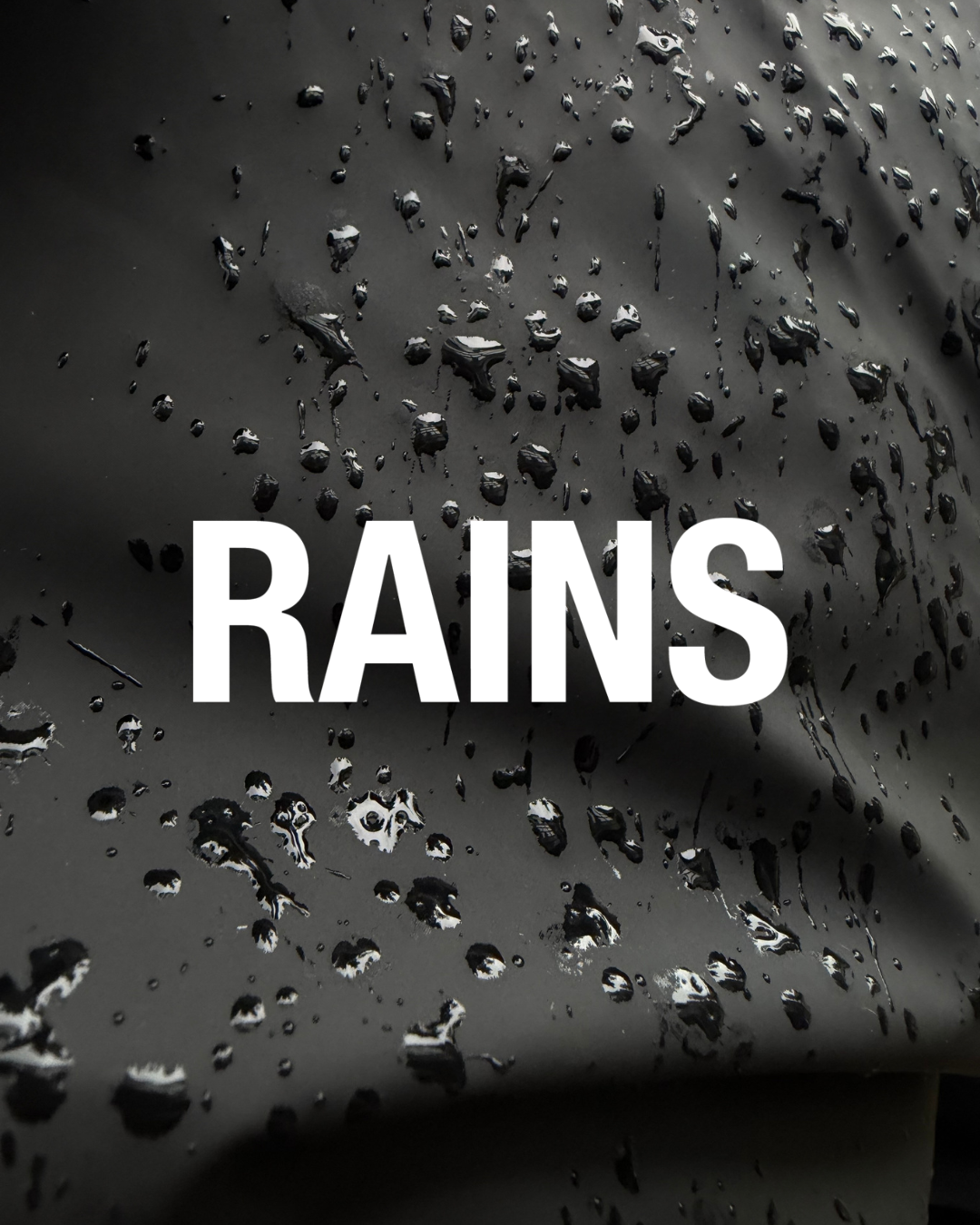 Rain droplets on a black Rains jacket